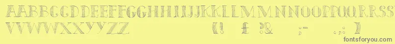 Weitere Informationen zur Capitals-Schriftart Capitals-Schriftart – Graue Schriften auf gelbem Hintergrund