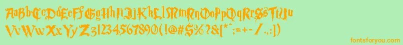 Magicschooltwo-Schriftart – Orangefarbene Schriften auf grünem Hintergrund