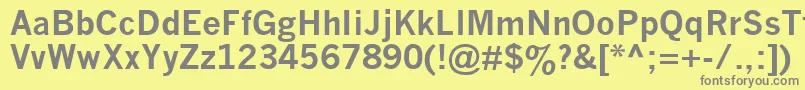 フォントNwgthcb – 黄色の背景に灰色の文字