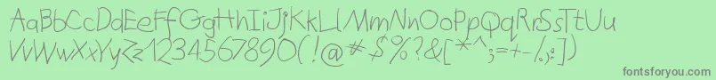 フォントQuicktypes – 緑の背景に灰色の文字