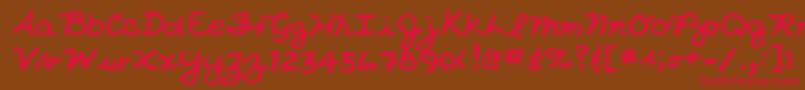 NicholeshandRegular Font – Red Fonts on Brown Background