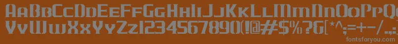 JLogCameronEdgeSmallCaps-Schriftart – Graue Schriften auf braunem Hintergrund