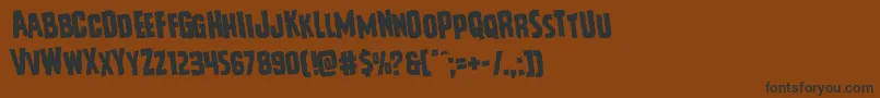Шрифт Vicioushungerrotate – чёрные шрифты на коричневом фоне