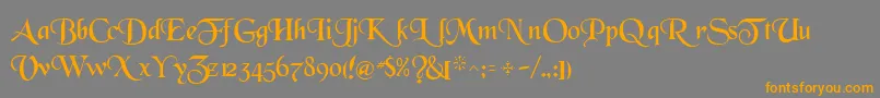 フォントWhiteRegularTtnorm – オレンジの文字は灰色の背景にあります。