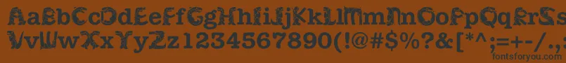 フォントKadinosob – 黒い文字が茶色の背景にあります