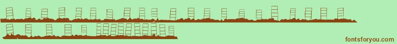 Fonte HollywoodCapitalBlank – fontes marrons em um fundo verde