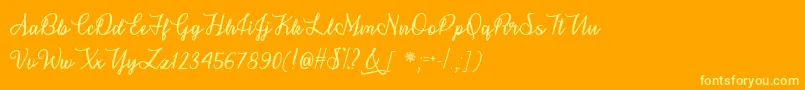 SnowflakeCalligraphyOtf Font – Yellow Fonts on Orange Background