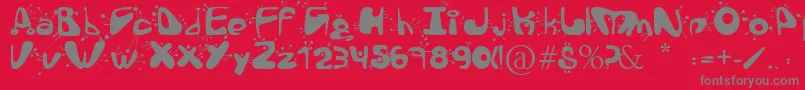 AlienLanguage-fontti – harmaat kirjasimet punaisella taustalla