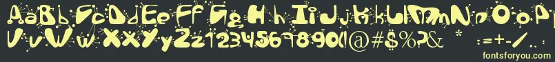 AlienLanguage Font – Yellow Fonts on Black Background