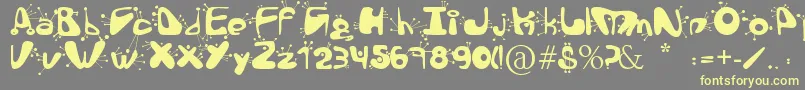 AlienLanguage Font – Yellow Fonts on Gray Background