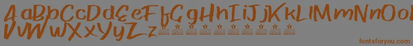 PaperRibRegPersonalUse-Schriftart – Braune Schriften auf grauem Hintergrund