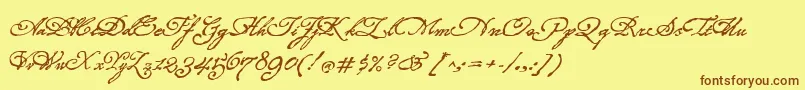 フォントRoanokeScript – 茶色の文字が黄色の背景にあります。