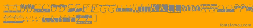 フォントGlitch – オレンジの背景に灰色の文字