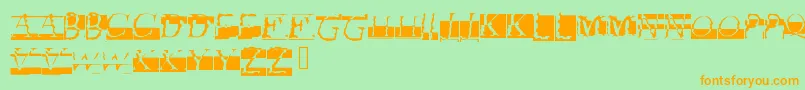 フォントGlitch – オレンジの文字が緑の背景にあります。