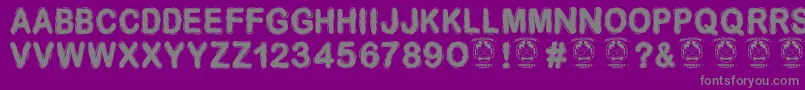 フォントDesminore – 紫の背景に灰色の文字