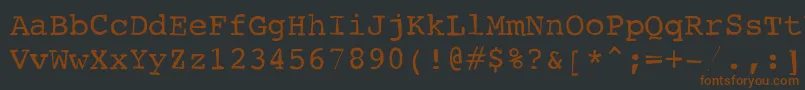 Шрифт Typewriterscribbled – коричневые шрифты на чёрном фоне