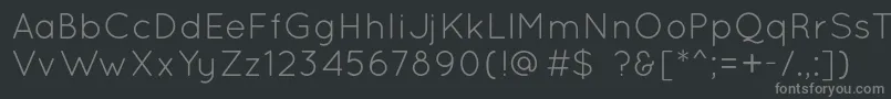 QuicksandBook-fontti – harmaat kirjasimet mustalla taustalla