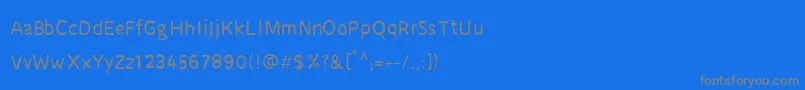 フォントCruSarawut57 – 青い背景に灰色の文字