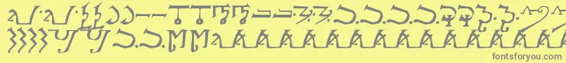 フォントAlpmagi – 黄色の背景に灰色の文字