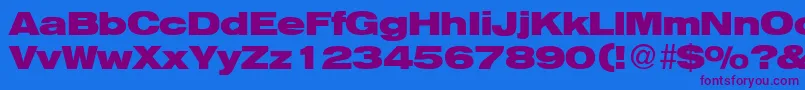 HelbaheavydbBold Font – Purple Fonts on Blue Background