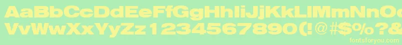 HelbaheavydbBold Font – Yellow Fonts on Green Background