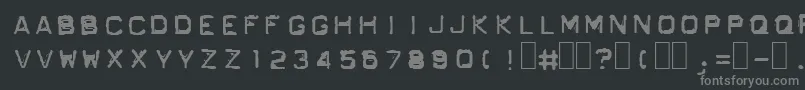 Fonte GfOrdnerInverted – fontes cinzas em um fundo preto