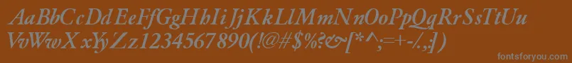 Garamondlightssk ffy-fontti – harmaat kirjasimet ruskealla taustalla