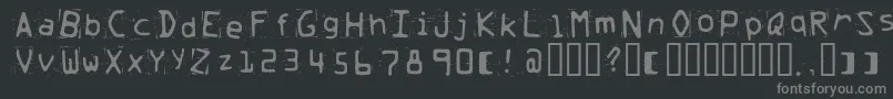 フォントTrash ffy – 黒い背景に灰色の文字