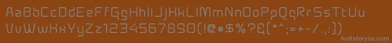 Шрифт Aunchantedxspace ffy – серые шрифты на коричневом фоне