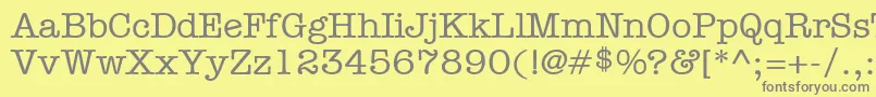 フォントItcAmericanTypewriterLtMediumAlternate – 黄色の背景に灰色の文字
