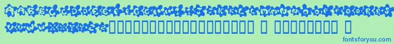 FriedEggsSmallcaps Font – Blue Fonts on Green Background