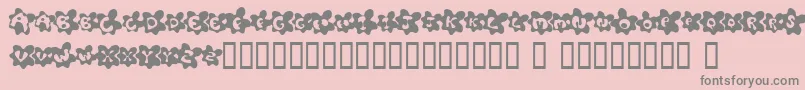 More about FriedEggsSmallcaps Font FriedEggsSmallcaps Font – Gray Fonts on Pink Background