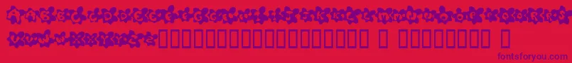 FriedEggsSmallcaps-Schriftart – Violette Schriften auf rotem Hintergrund