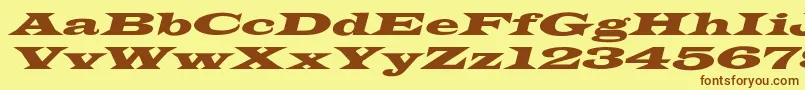 Czcionka JamesWideextoblNormal – brązowe czcionki na żółtym tle