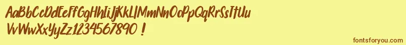 Travelgoals Font – Brown Fonts on Yellow Background