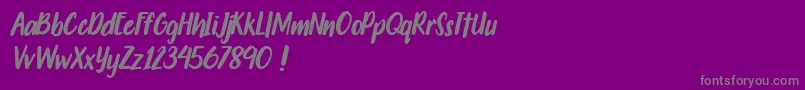 Travelgoals-Schriftart – Graue Schriften auf violettem Hintergrund