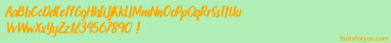 Travelgoals-Schriftart – Orangefarbene Schriften auf grünem Hintergrund
