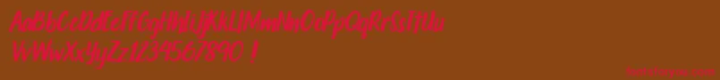 Weitere Informationen zur Travelgoals-Schriftart Travelgoals-Schriftart – Rote Schriften auf braunem Hintergrund