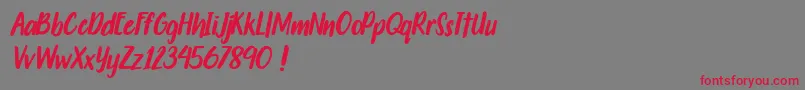 Travelgoals Font – Red Fonts on Gray Background