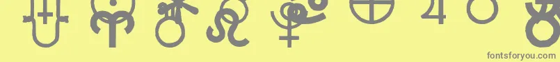Carrastrodings-fontti – harmaat kirjasimet keltaisella taustalla