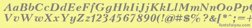 KudrashovBoldItalic-Schriftart – Graue Schriften auf gelbem Hintergrund