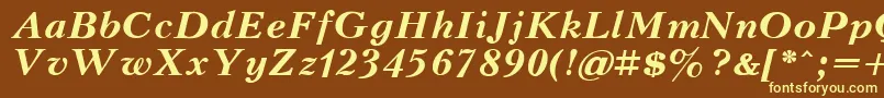 KudrashovBoldItalic-Schriftart – Gelbe Schriften auf braunem Hintergrund