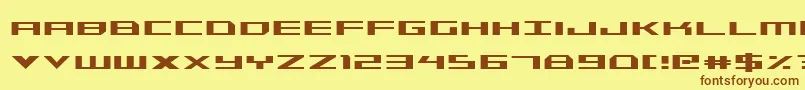 フォントTriremecond – 茶色の文字が黄色の背景にあります。