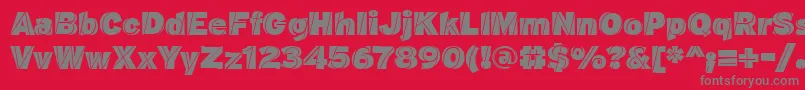 J.M-fontti – harmaat kirjasimet punaisella taustalla