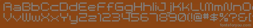 Czcionka BmSpaceA9 – szare czcionki na brązowym tle