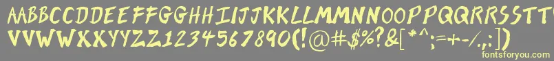 BrushOfKent Font – Yellow Fonts on Gray Background