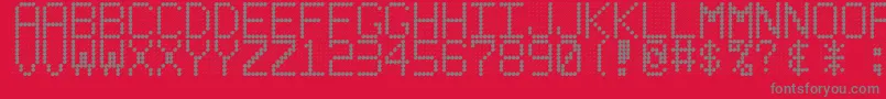Ledbdrev-Schriftart – Graue Schriften auf rotem Hintergrund
