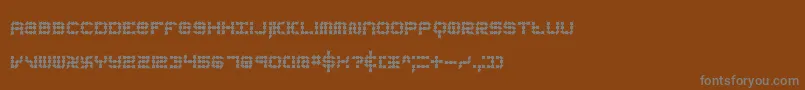 KonectorEerieBrk-fontti – harmaat kirjasimet ruskealla taustalla