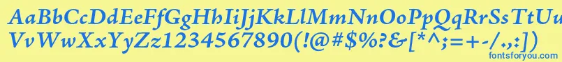 AjensonproBolditcapt Font – Blue Fonts on Yellow Background