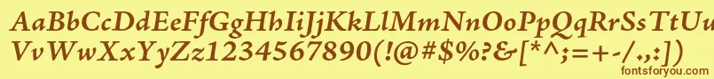 フォントAjensonproBolditcapt – 茶色の文字が黄色の背景にあります。